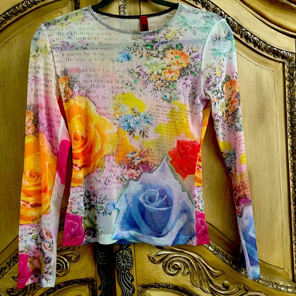 Sheer long sleeve floral top with crystal accents. Unique, boutique style!